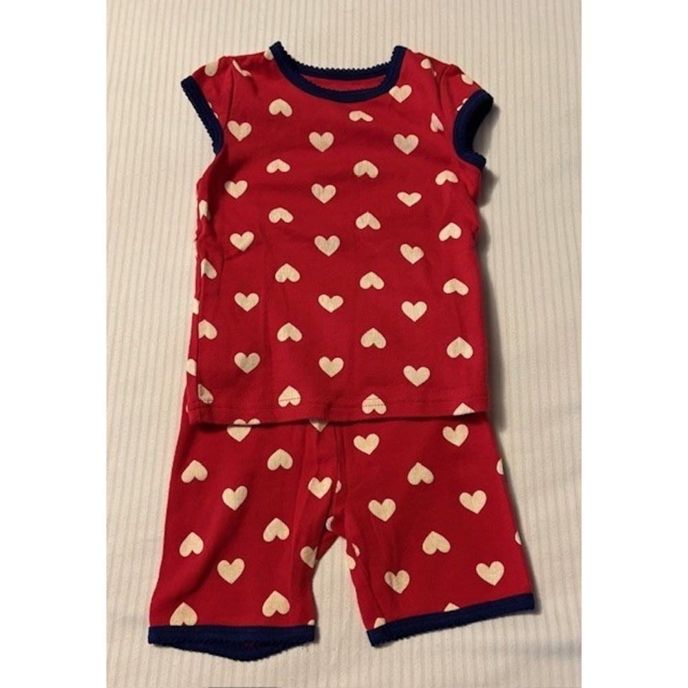 Carters size 2T 2 piece pajama set, red with white hearts and blue border